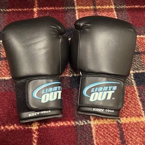Women’s size small Lights Out Black Boxing Gloves. Worn for one class.